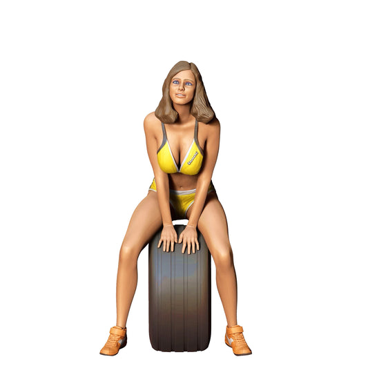 Product photo 0: Grid Girl: Woman with Tire - Racing Operation
