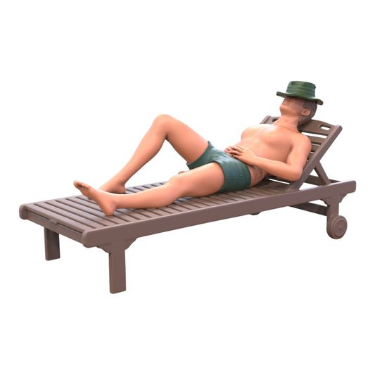 Product photo diorama and model building miniature figure: man on a deck chair - vacationer at the beach