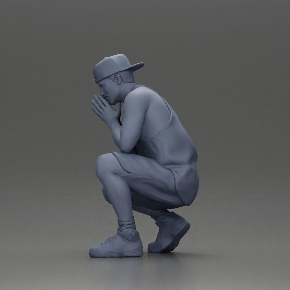 Diorama model building product photo 11: Diorama miniature: Pensive man sitting with cap, shorts, and sneakers (Ref No. A77)