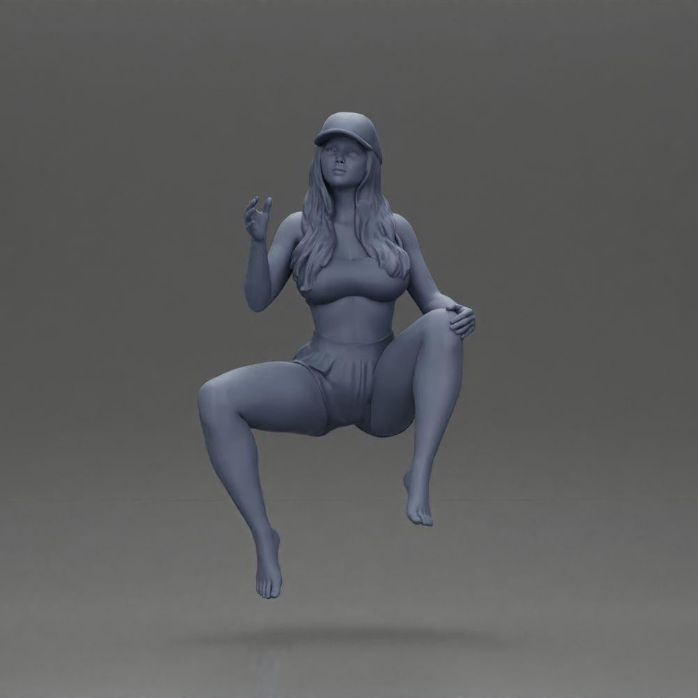 Diorama model building product photo 11: Diorama figure: Sitting female miniature, blue top & shorts, cap, barefoot - relaxed pose (Ref No. A133)