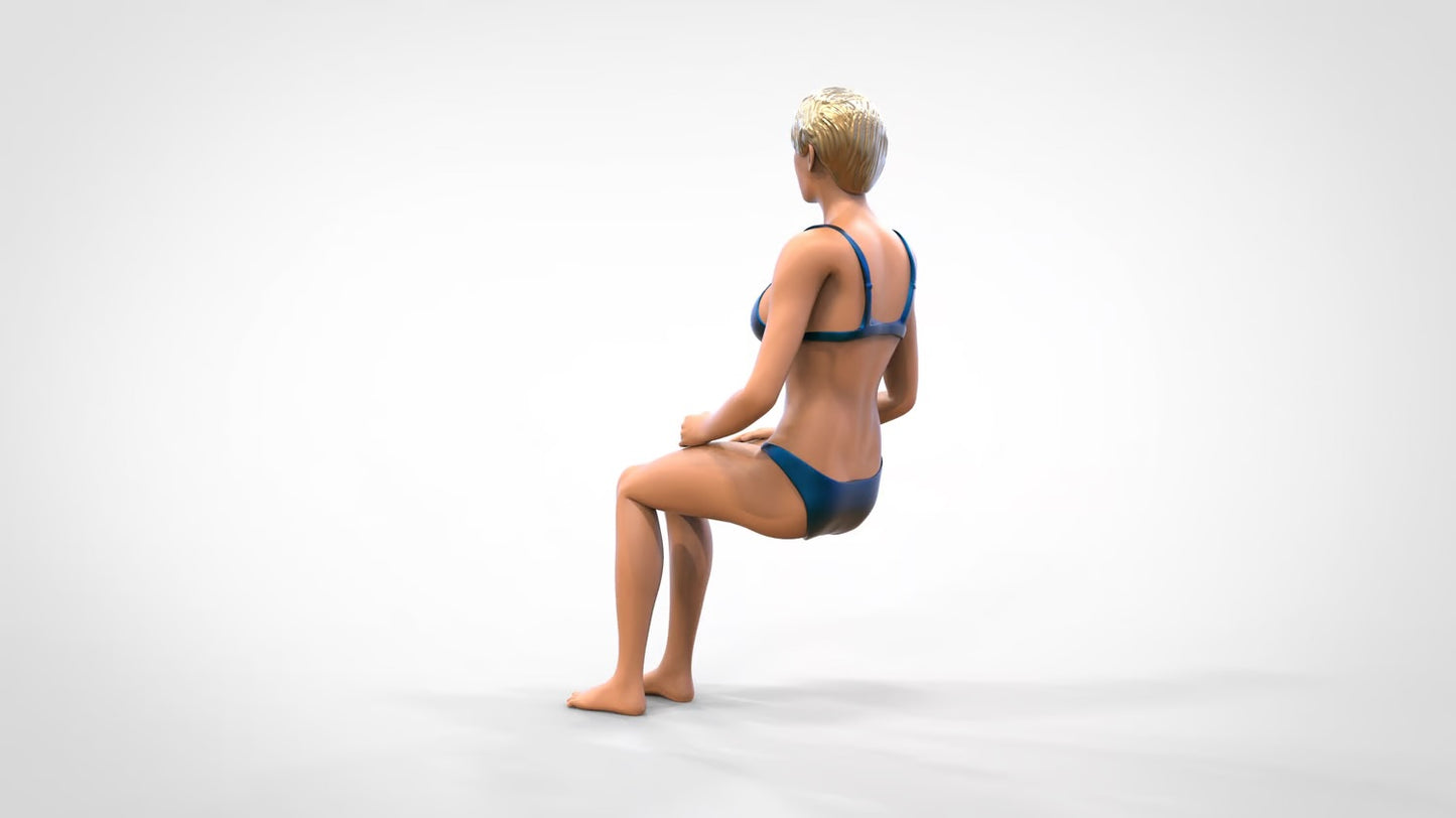 Product photo 0: Woman in bikini - sitting