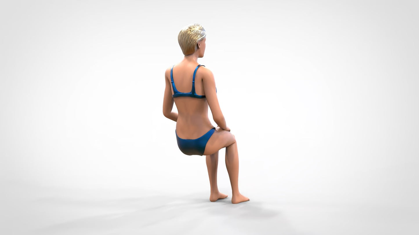 Product photo 0: Woman in bikini - sitting