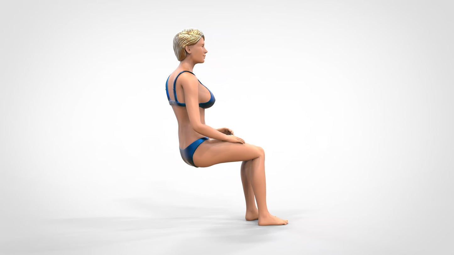 Product photo 0: Woman in bikini - sitting