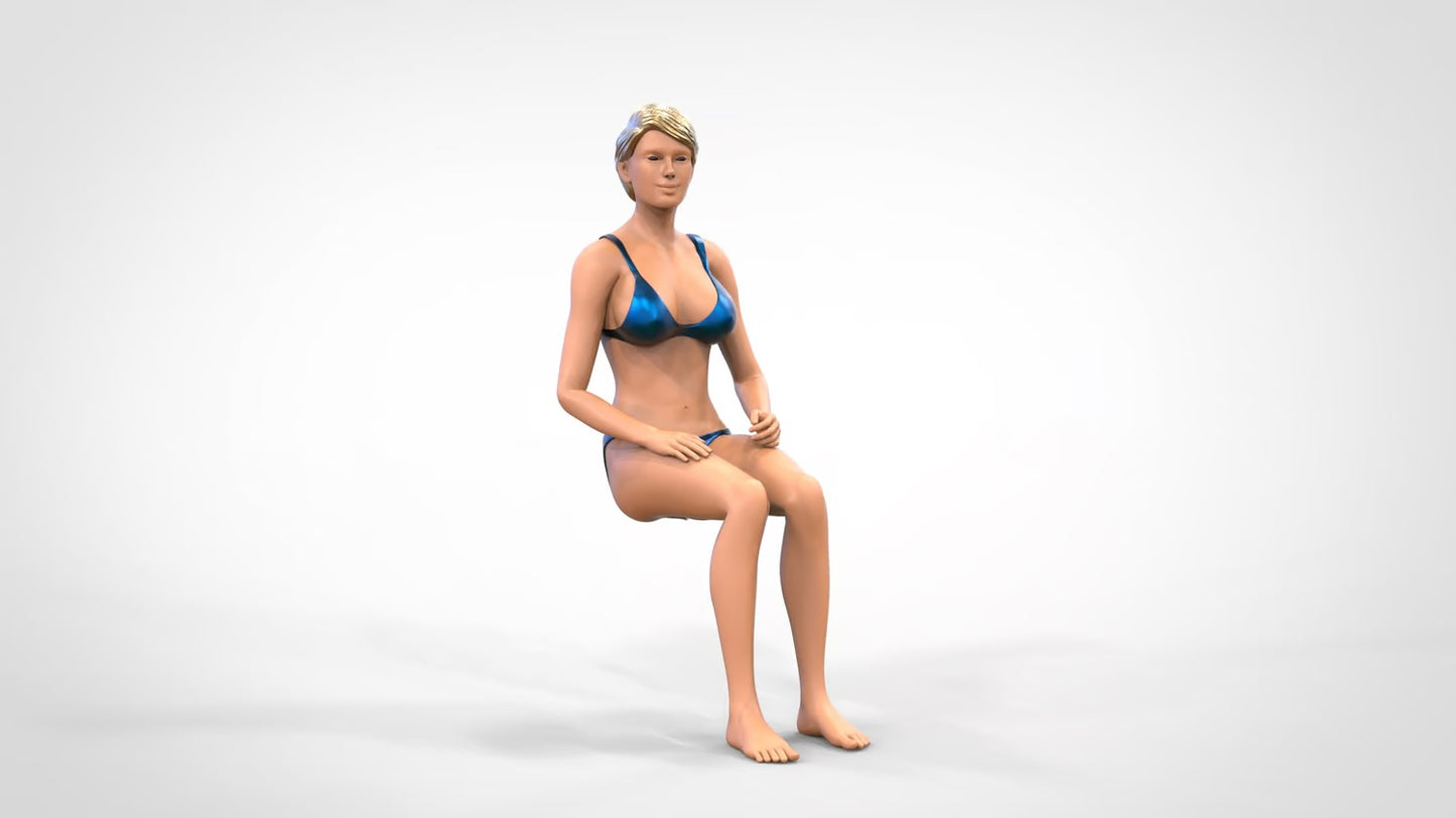 Product photo 0: Woman in bikini - sitting
