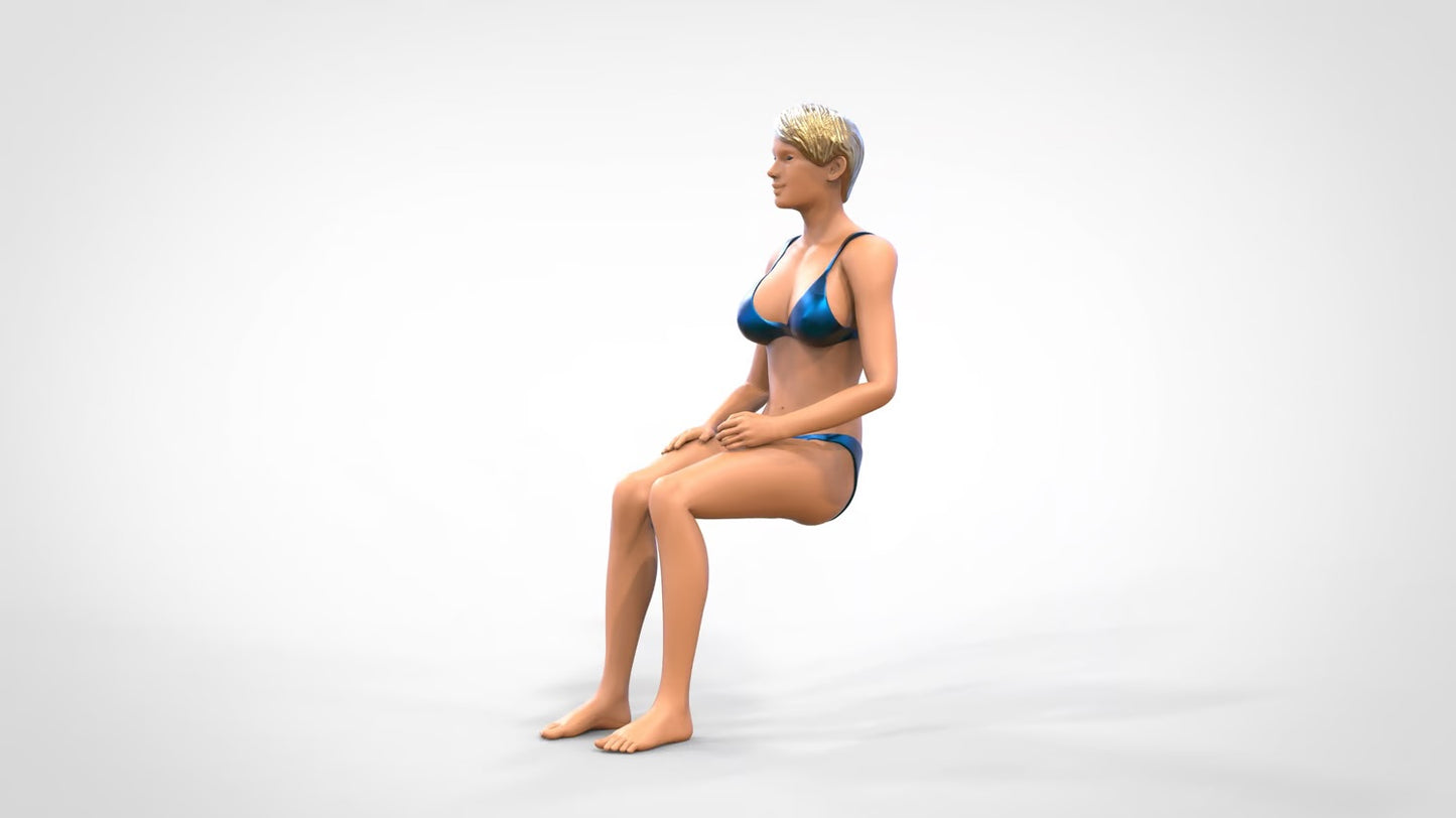 Product photo 0: Woman in bikini - sitting