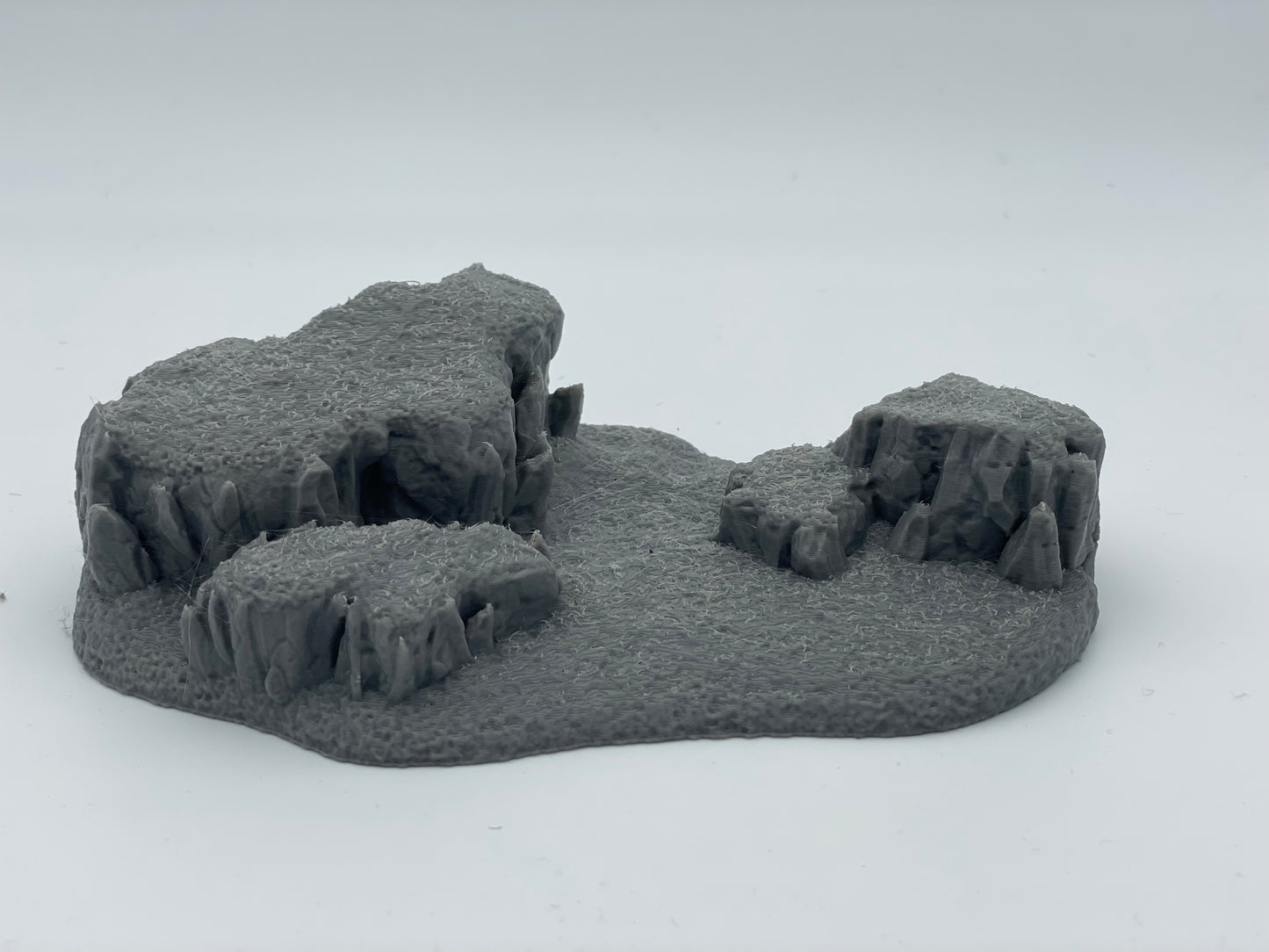 Product photo Tabletop 28mm The Printing Goes Ever On (TPGEO) 0: Hill Terrain Type E - Gentle Rise in Grassland - Rocks