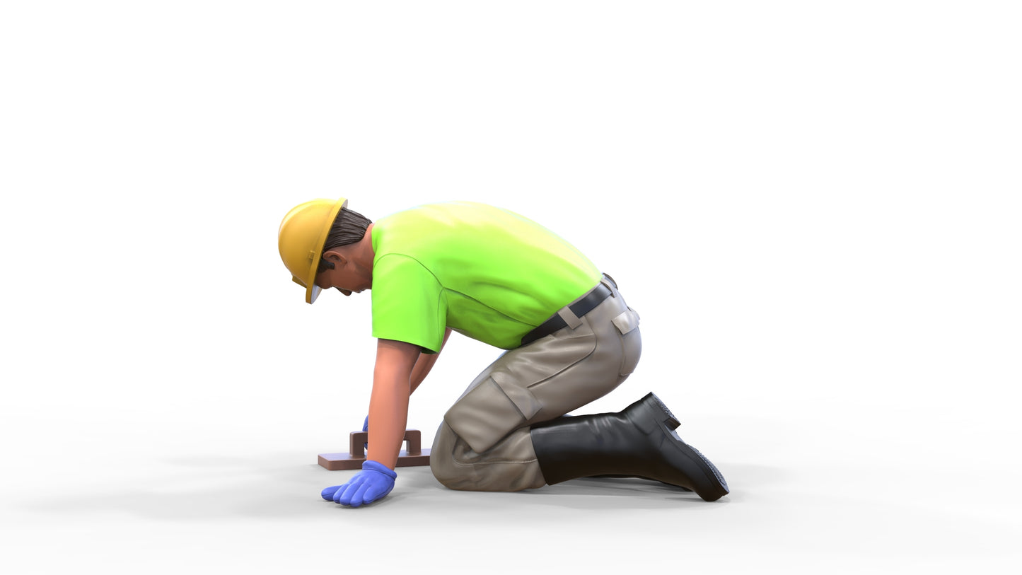 Product photo diorama and model building miniature figure: Construction worker 1 - kneeling tiler with helmet