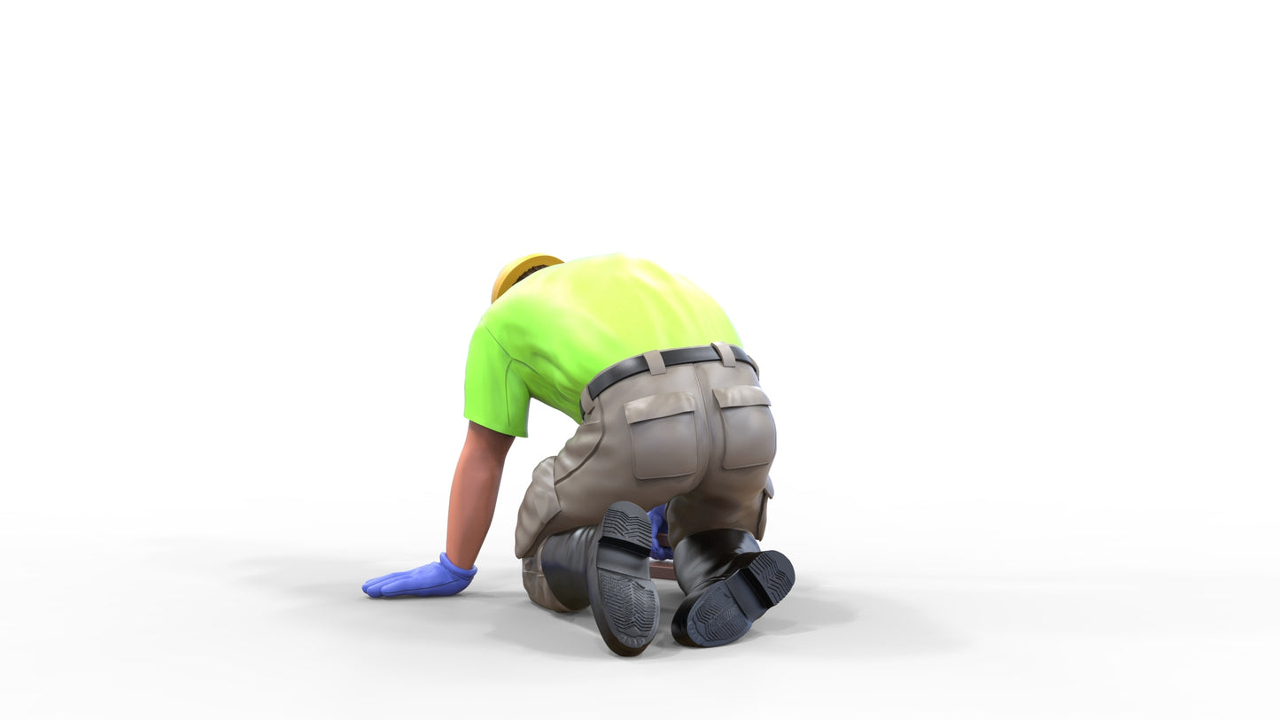 Product photo diorama and model building miniature figure: Construction worker 1 - kneeling tiler with helmet