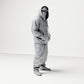 Diorama model building product photo 3: Standing figure: Person with hooded jacket, baseball cap & face cloth, hands in pockets (B034)