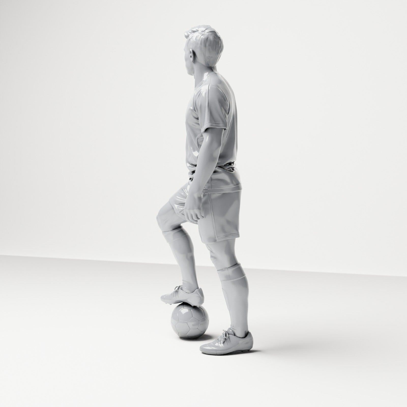 Diorama model building product photo 1: Standing figure: Football player with foot on ball (B035)