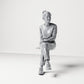 Diorama model making product photo 0: Seated female spectator with crossed legs and hands in her lap (B055)