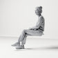Diorama model-making product photo 1: Seated female spectator with crossed legs and hands in her lap (B055)