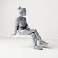 Diorama model-making product photo 3: Seated female spectator with crossed legs and hands in her lap (B055)