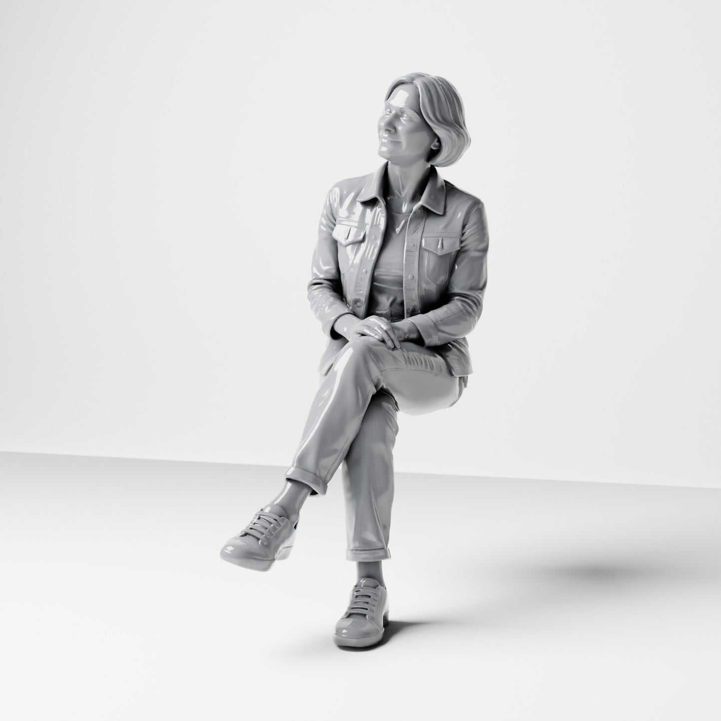 Diorama model-making product photo 0: Seated female spectator with crossed legs and hands on knee (B056)