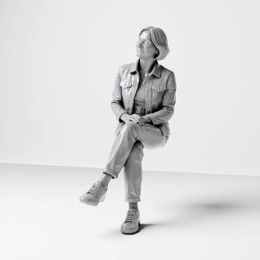Diorama model-making product photo 0: Seated female spectator with crossed legs and hands on knee (B056)