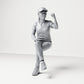 Diorama model-making product photo 0: Seated figure: female spectator with crossed legs & raised fist (B057)