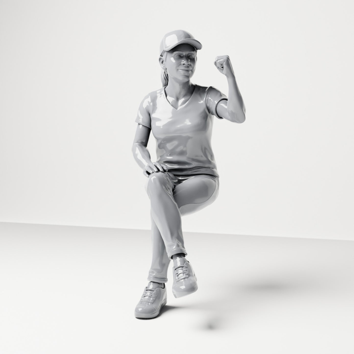 Diorama model-making product photo 0: Seated figure: female spectator with crossed legs & raised fist (B057)