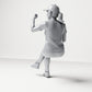 Diorama model-making product photo 2: Seated figure: female spectator with crossed legs & raised fist (B057)