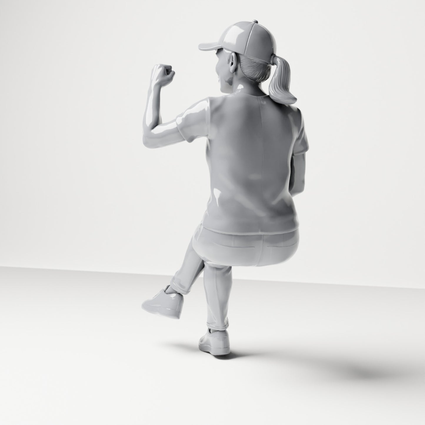 Diorama model-making product photo 2: Seated figure: female spectator with crossed legs & raised fist (B057)