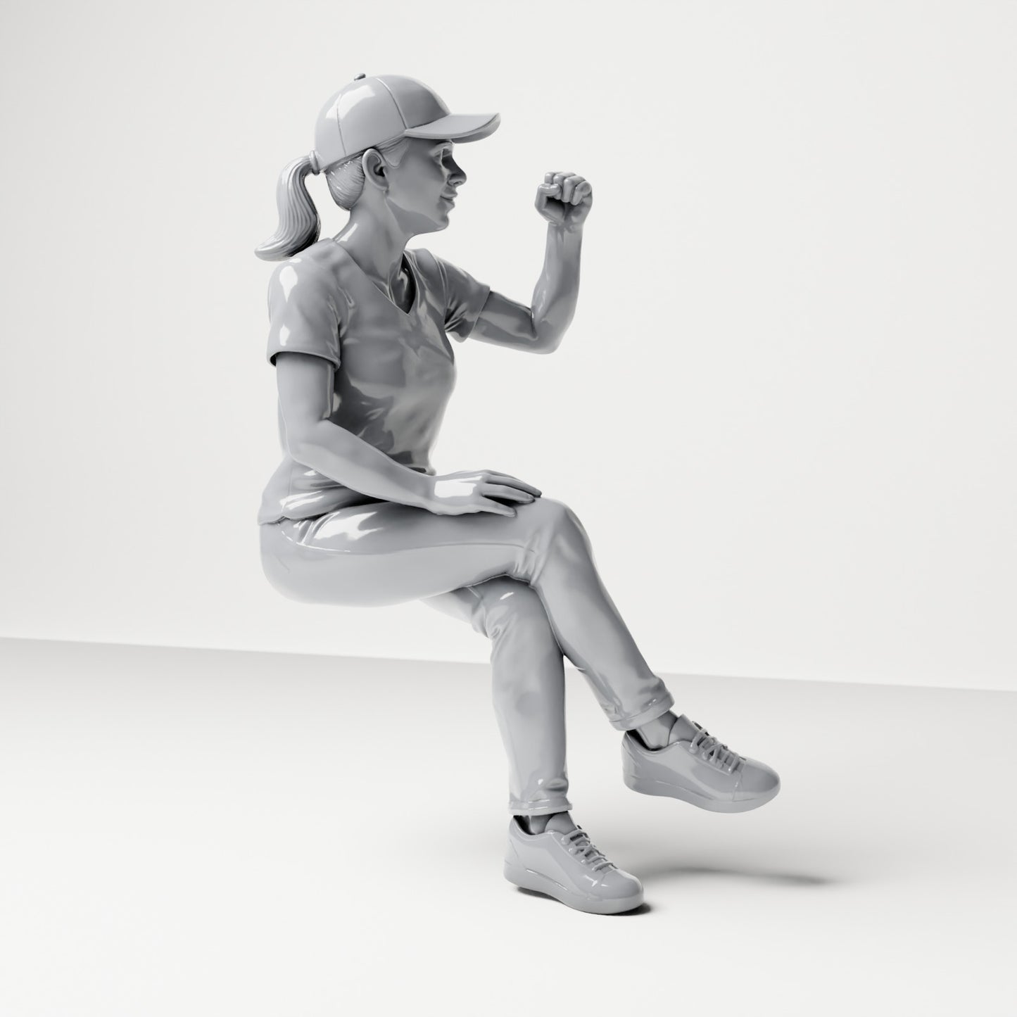 Diorama model-making product photo 3: Seated figure: female spectator with crossed legs & raised fist (B057)