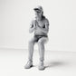 Diorama model making product photo 0: Seated figure: spectator with hands clasped in front of her chest (B058)