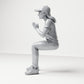Diorama model-making product photo 1: Seated figure: female spectator with hands clasped in front of her chest (B058)