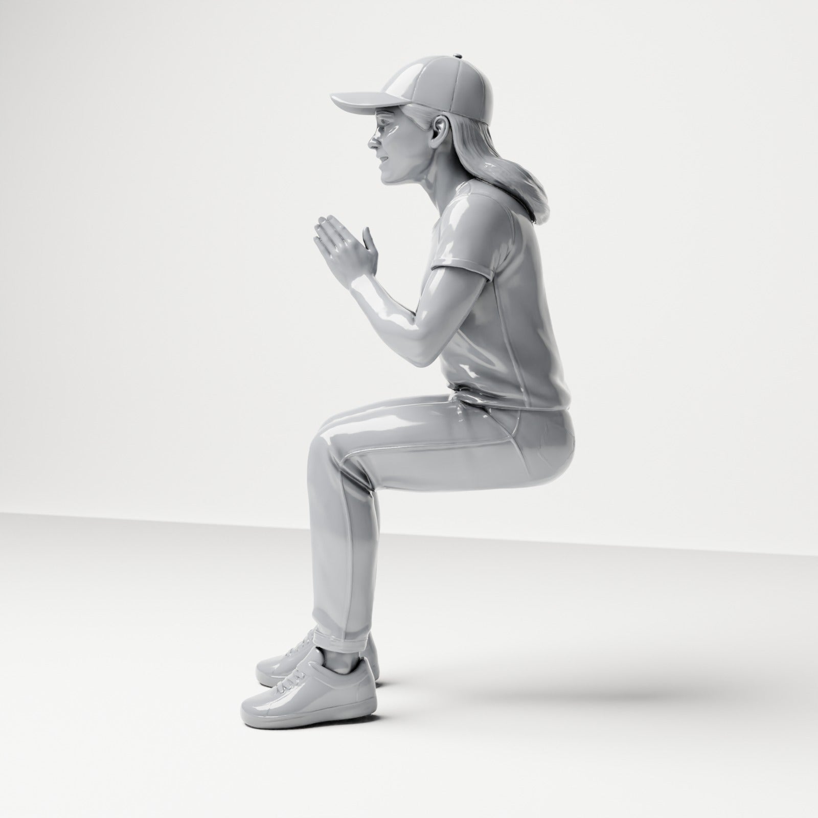 Diorama model-making product photo 1: Seated figure: female spectator with hands clasped in front of her chest (B058)