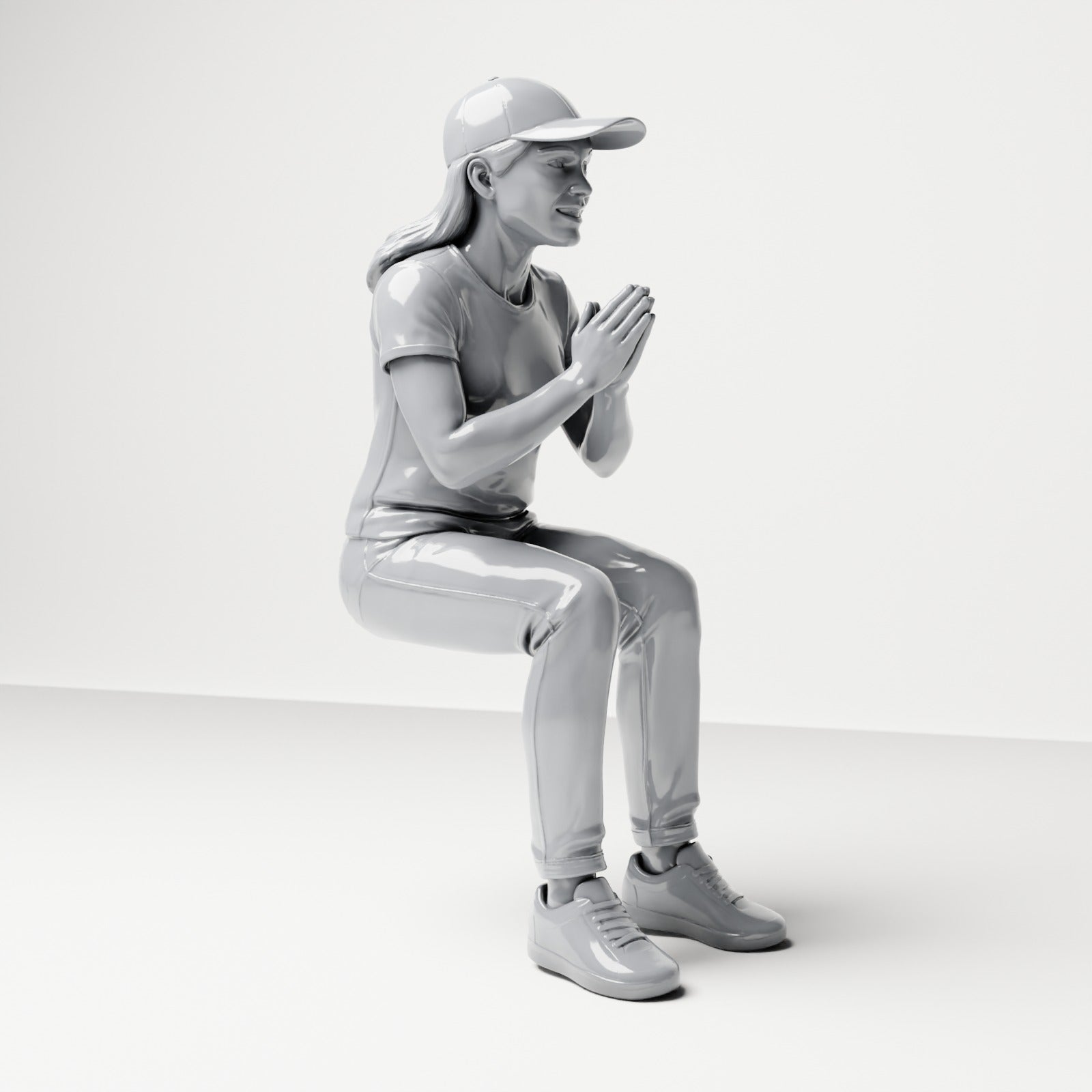 Diorama model-making product photo 3: Seated figure: female spectator with hands clasped in front of her chest (B058)