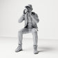 Diorama model-making product photo 0: Seated figure: shouting spectator with hands around mouth (B060)