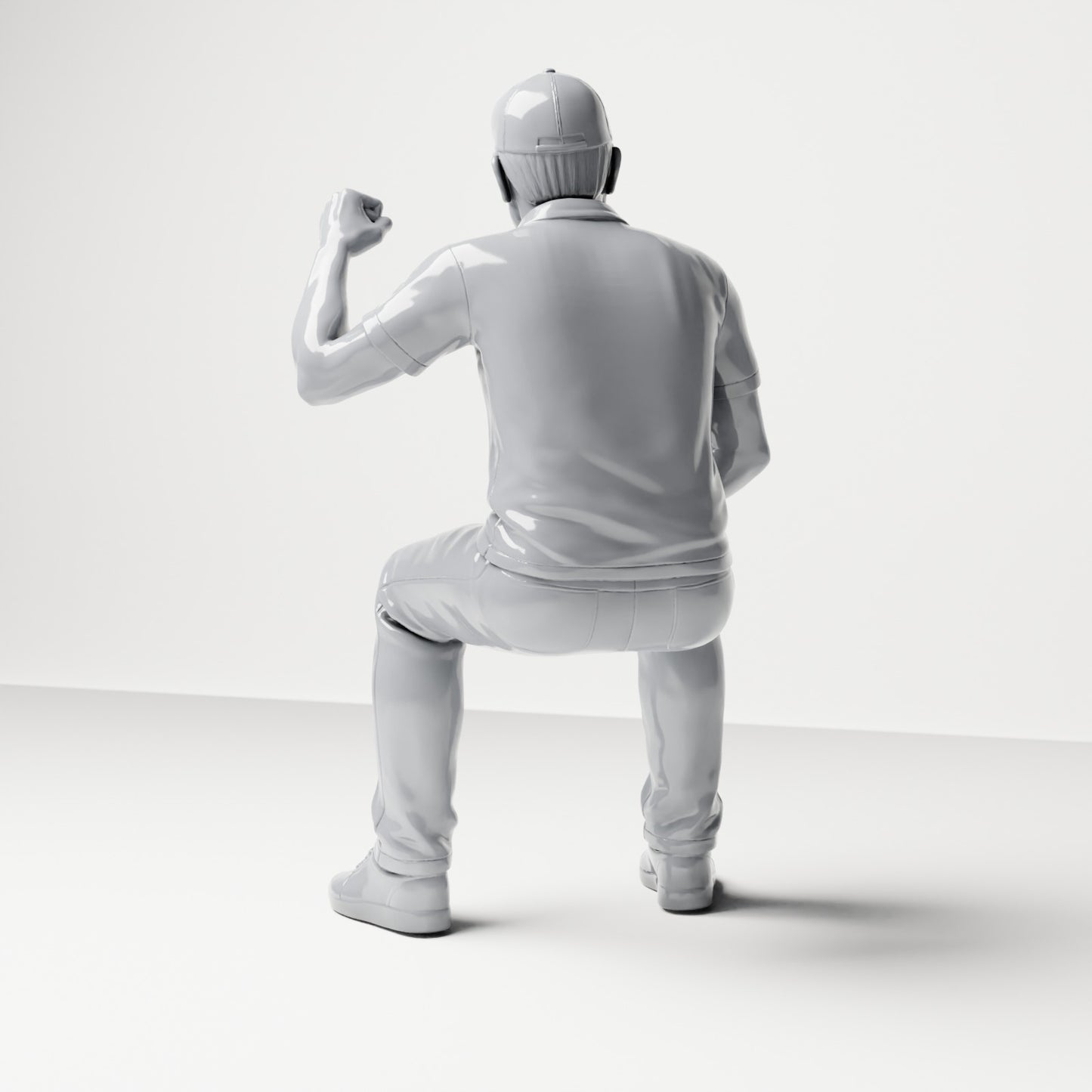 Diorama model-making product photo 2: Seated figure: Male spectator with raised clenched fist (B065)