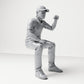Diorama model-making product photo 3: Seated figure: Male spectator with raised clenched fist (B065)