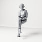Diorama model-making product photo 0: Seated female spectator with crossed legs & folded hands (B069)
