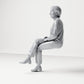 Diorama model-making product photo 1: Seated figure: female spectator with crossed legs and folded hands (B069)