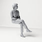 Diorama model-making product photo 3: Seated figure: female spectator with crossed legs & folded hands (B069)