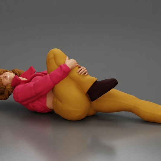 Diorama model building product photo 0: Reclining woman in mini jacket holding injured knee - diorama miniature (Ref No. A87)