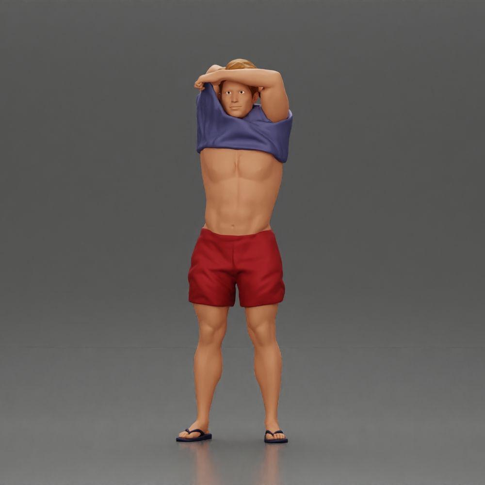 Diorama model building product photo 0: Standing miniature: muscular man in shorts pulling T-shirt over his head (Ref No. A90)