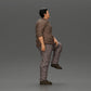 Diorama model building product photo 1: miniature figure: stout Asian man, looking up, in shirt, foot on step (Ref No. A101)