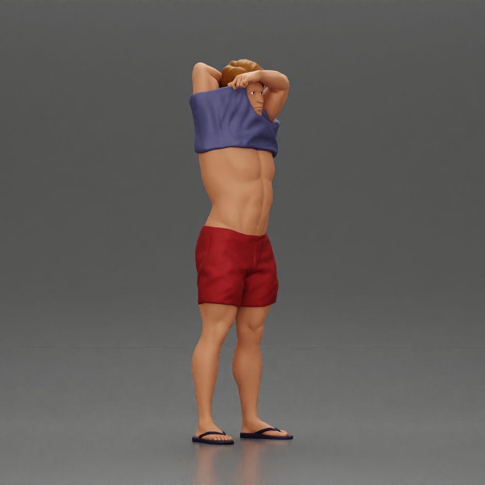 Diorama model building product photo 1: Standing miniature: muscular man in shorts pulling T-shirt over his head (Ref No. A90)