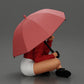 Diorama model building product photo 1: Diorama miniature: Sitting woman in jacket and shorts with open umbrella (Ref No. A85)