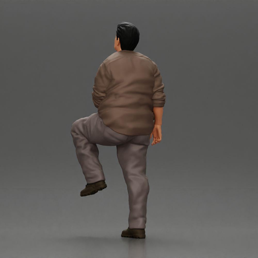 Diorama model building product photo 3: miniature figure: stout Asian man, looking up, in shirt, foot on step (Ref No. A101)