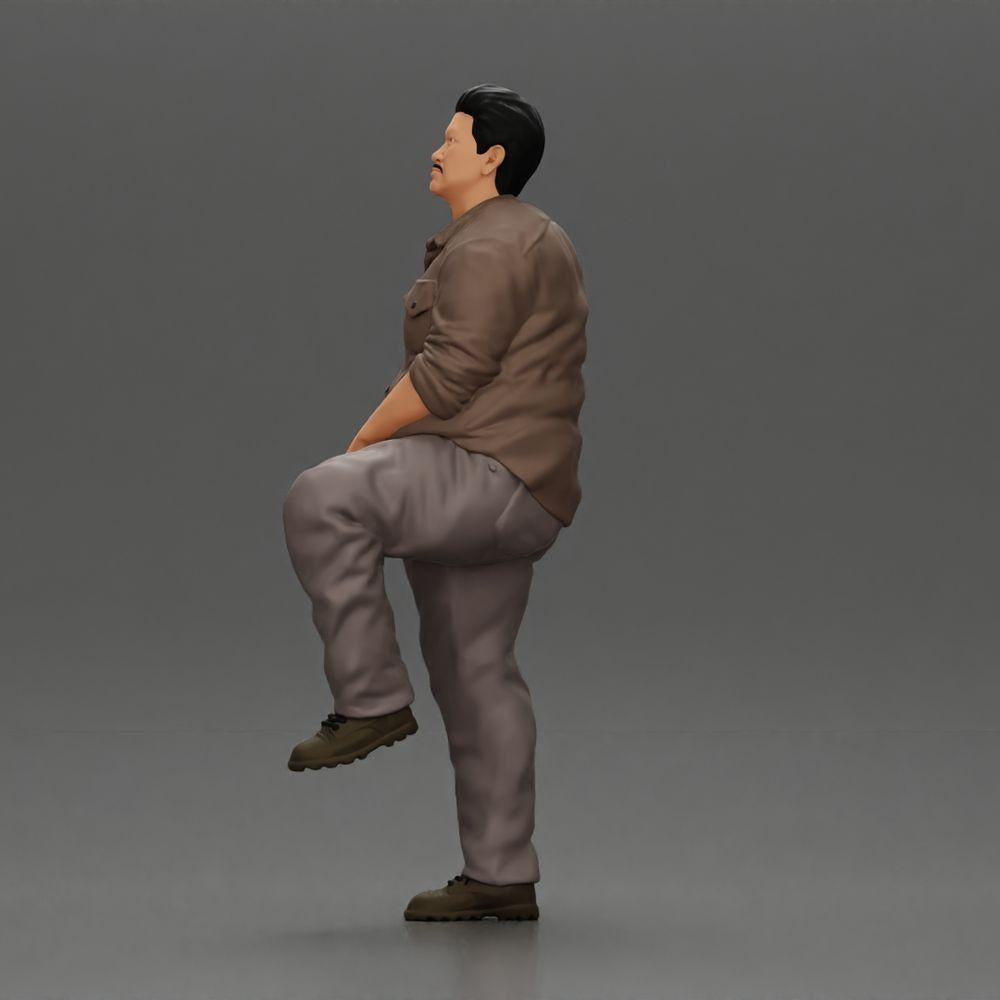 Diorama model building product photo 4: miniature figure: stout Asian man, looking up, in shirt, foot on step (Ref No. A101)