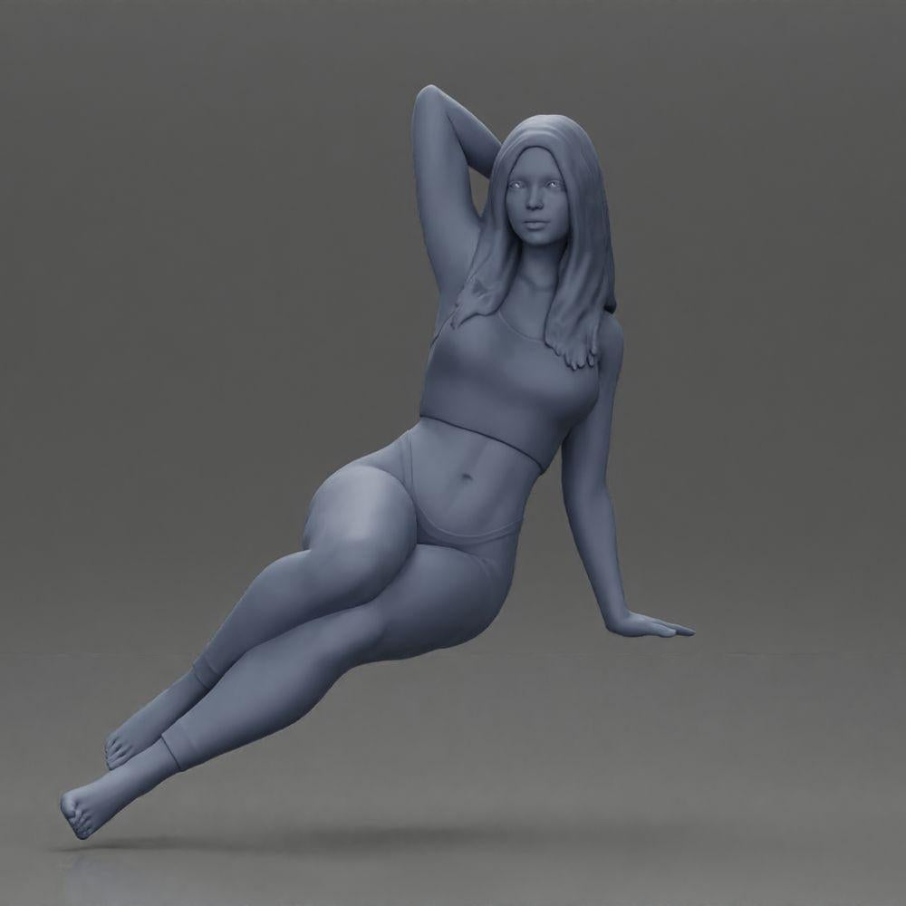 Diorama model building product photo 6: miniature figure: woman in leggings, sitting sideways on a sofa, arm behind her head (Ref No. A68)