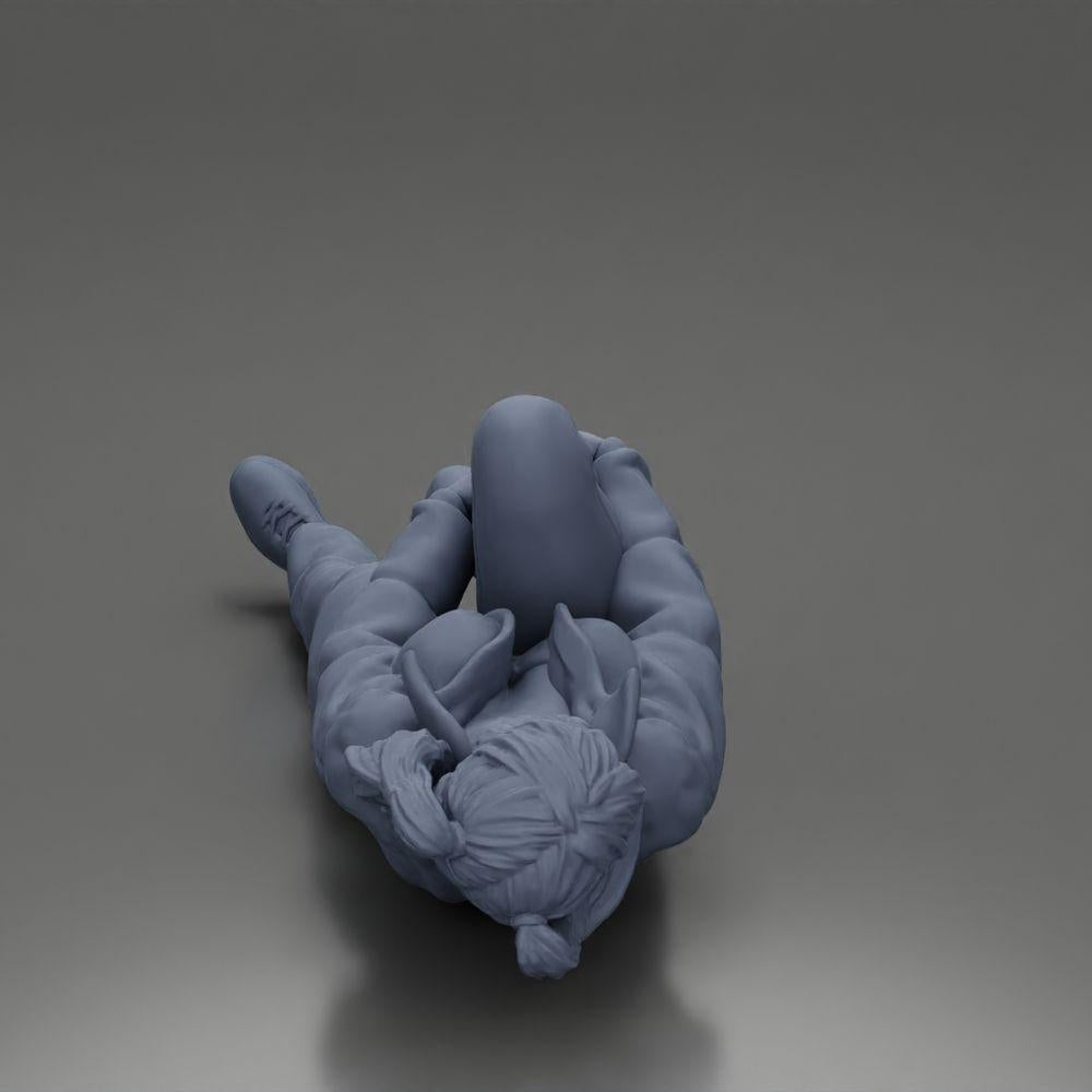 Diorama model building product photo 8: Woman lying down in a mini jacket holding injured knee - diorama miniature (Ref No. A87)