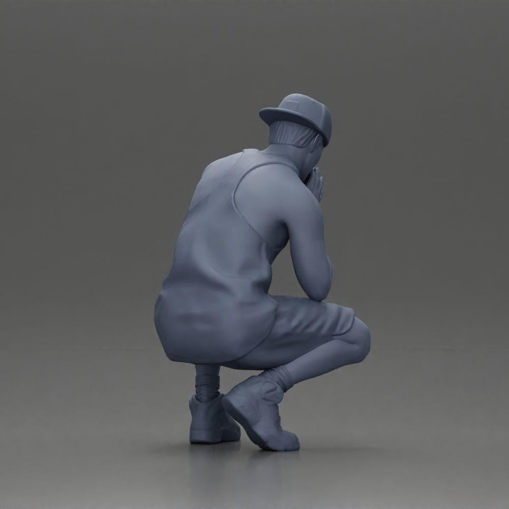 Diorama model building product photo 9: Diorama miniature: Pensive man sitting with cap, shorts, and sneakers (Ref No. A77)
