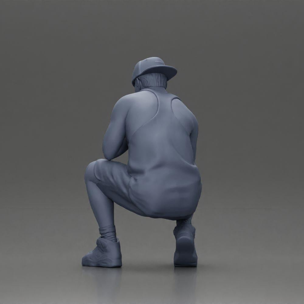 Diorama model building product photo 10: Diorama miniature: Pensive man sitting with cap, shorts, and sneakers (Ref No. A77)