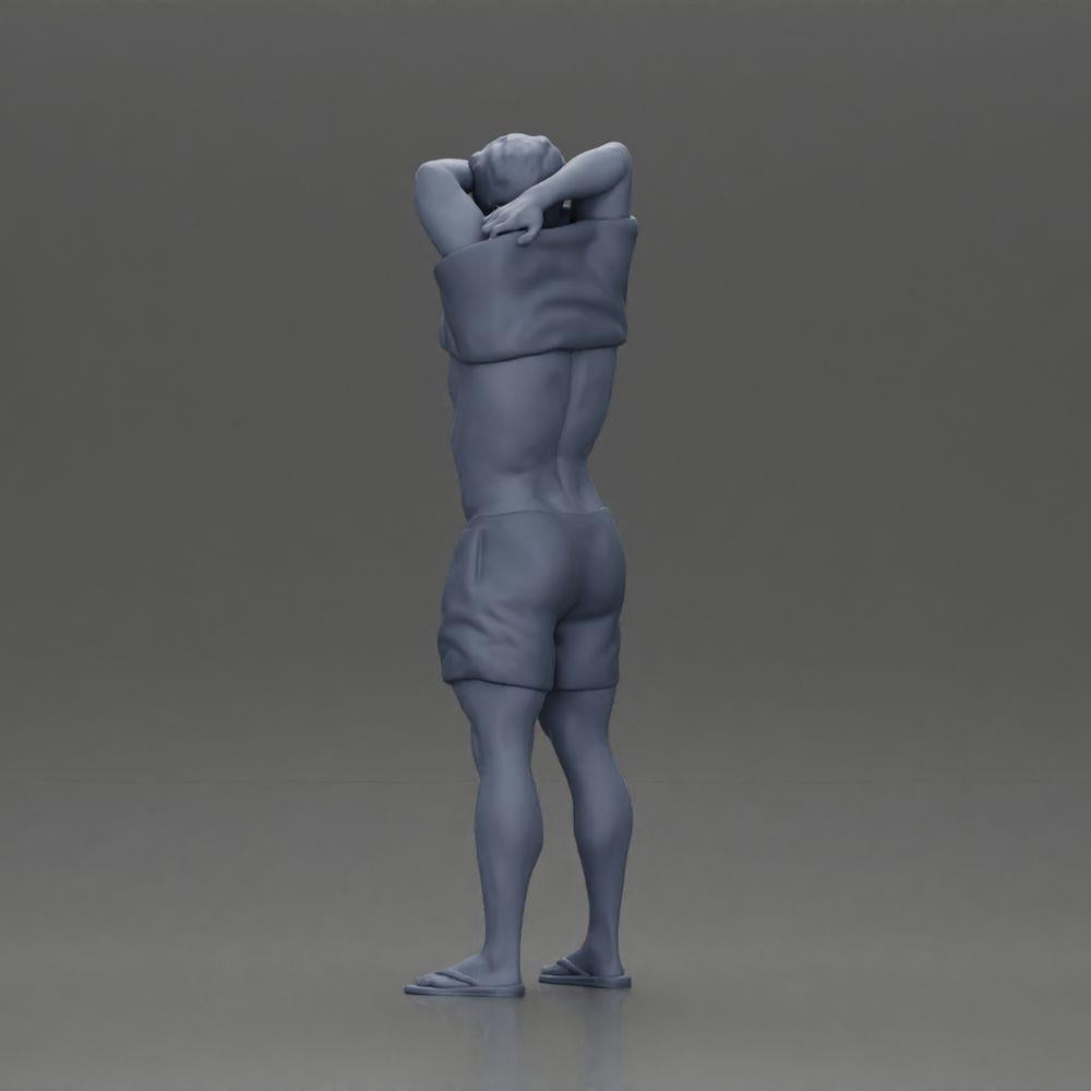 Diorama model building product photo 10: Standing miniature: muscular man in shorts pulling T-shirt over his head (Ref No. A90)