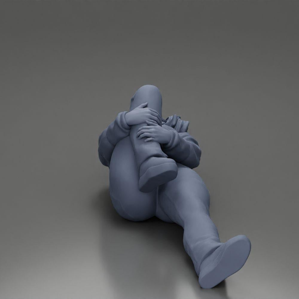 Diorama model building product photo 11: reclining woman in mini jacket holding injured knee - diorama miniature (Ref No. A87)