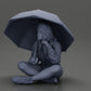 Diorama model building product photo 11: Diorama miniature: Sitting woman in jacket and shorts with open umbrella (Ref No. A85)