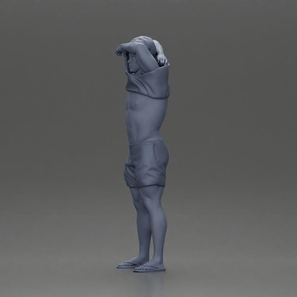 Diorama model building product photo 11: Standing miniature: muscular man in shorts pulling T-shirt over his head (Ref No. A90)
