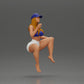 Diorama model building product photo 0: Diorama figure: Sitting female miniature, blue top & shorts, cap, barefoot - relaxed pose (Ref No. A133)
